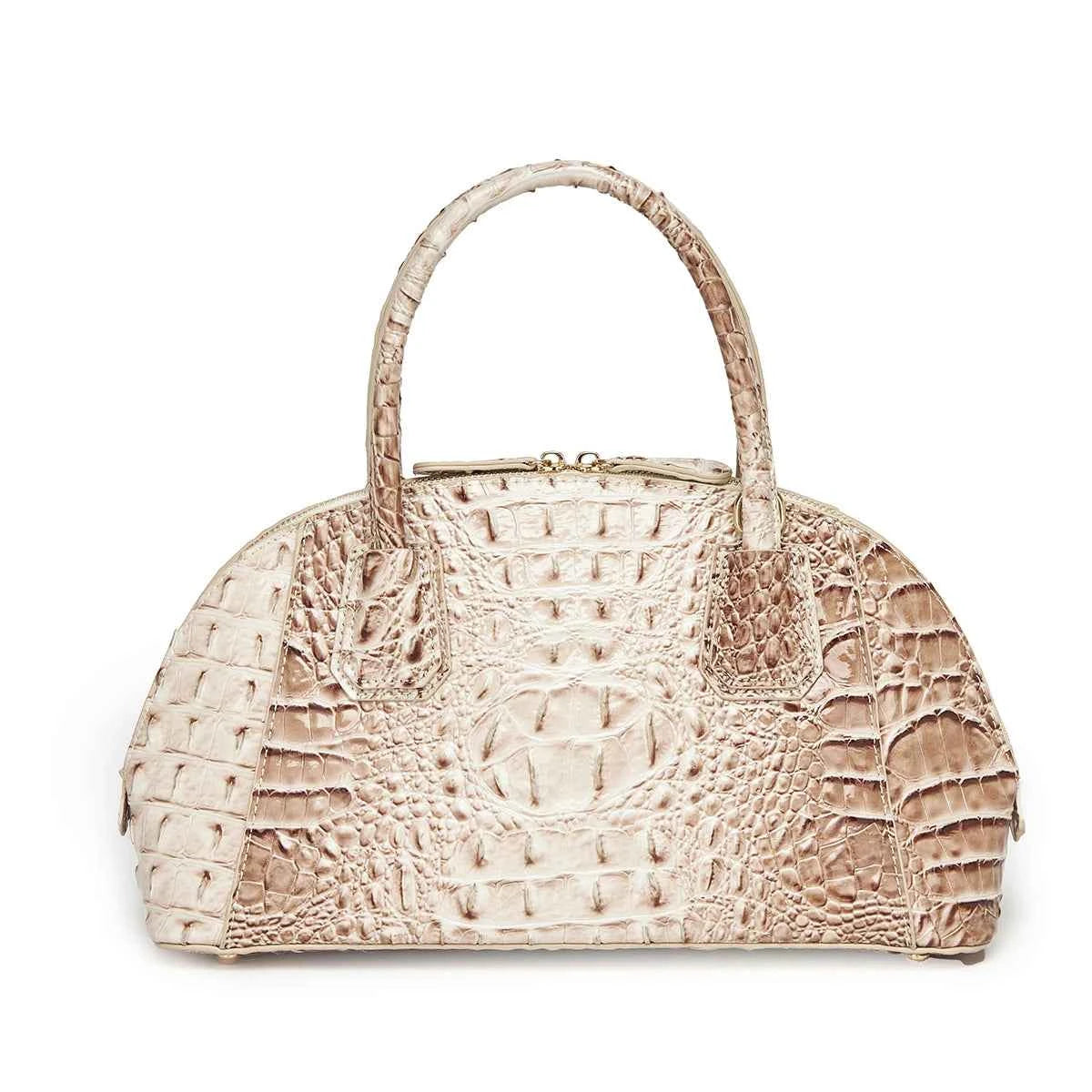 Pink crossbody bag with top handle and dome-shaped design, suitable for women, by Corporación Turística.
