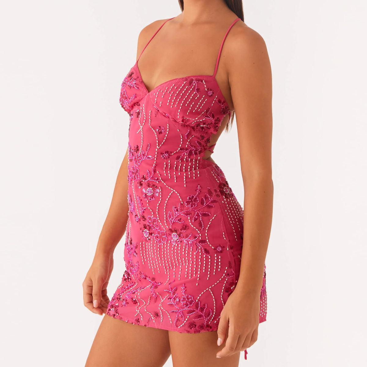 Pink minidress for women with shiny sequins, featuring a sexy style from Corporación Turística, perfect for night outings.