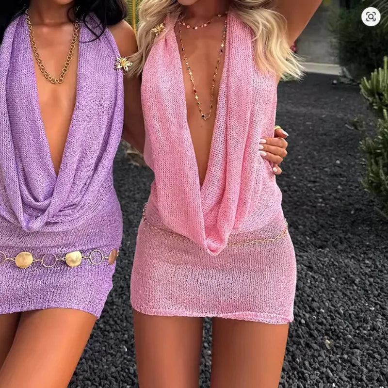 Pink sexy mini dress by Corporación Turística with deep V neckline, knitted fabric, form-fitting design for women.