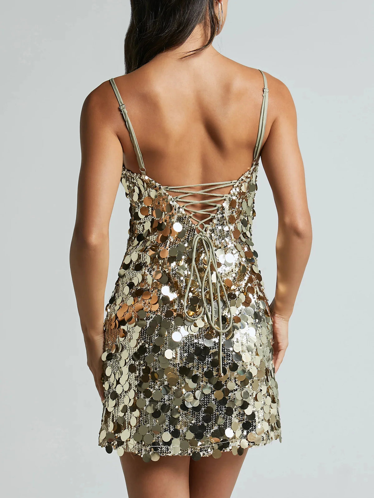 Mini shiny dress for women with embroidered sequins, featuring a bright pink fabric and stylish design by Corporación Turística.