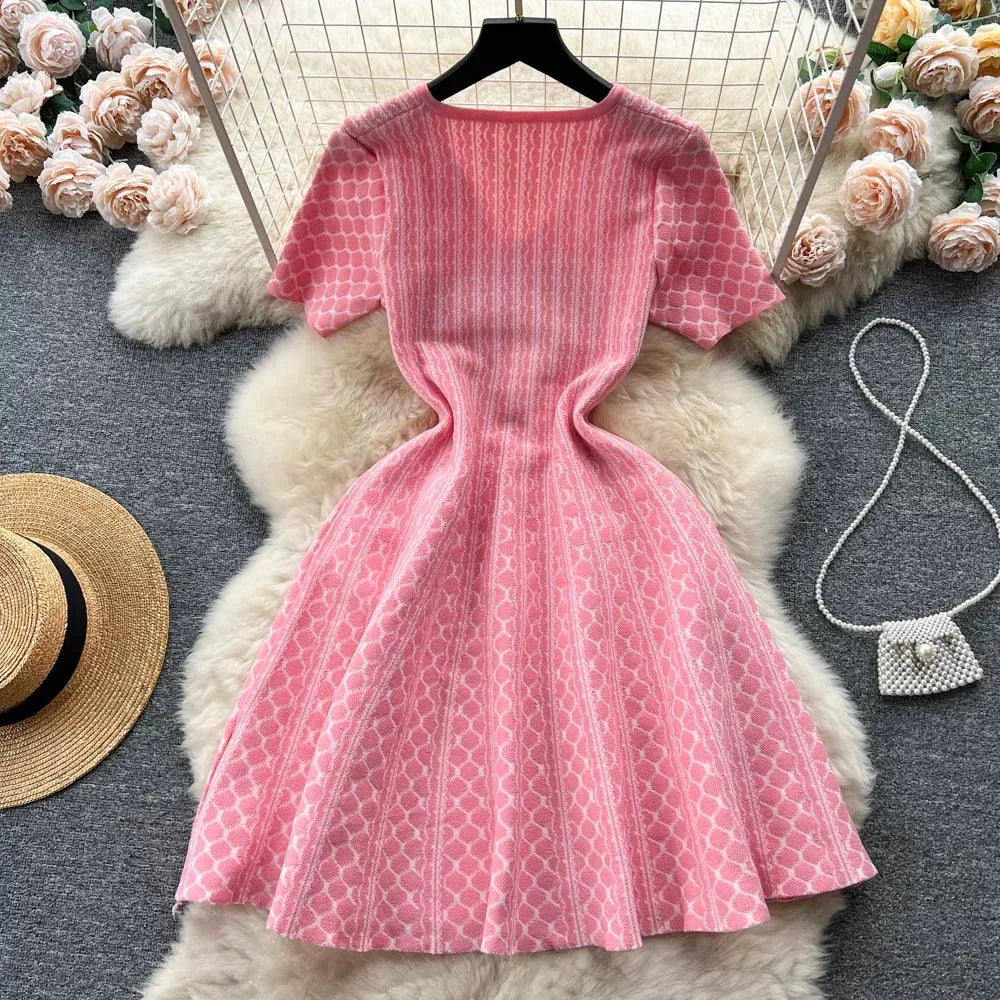 Pink YuooMuoo short knit dress with A-line cut, featuring a stylish, fitted design and sleeveless style, perfect for casual wear.