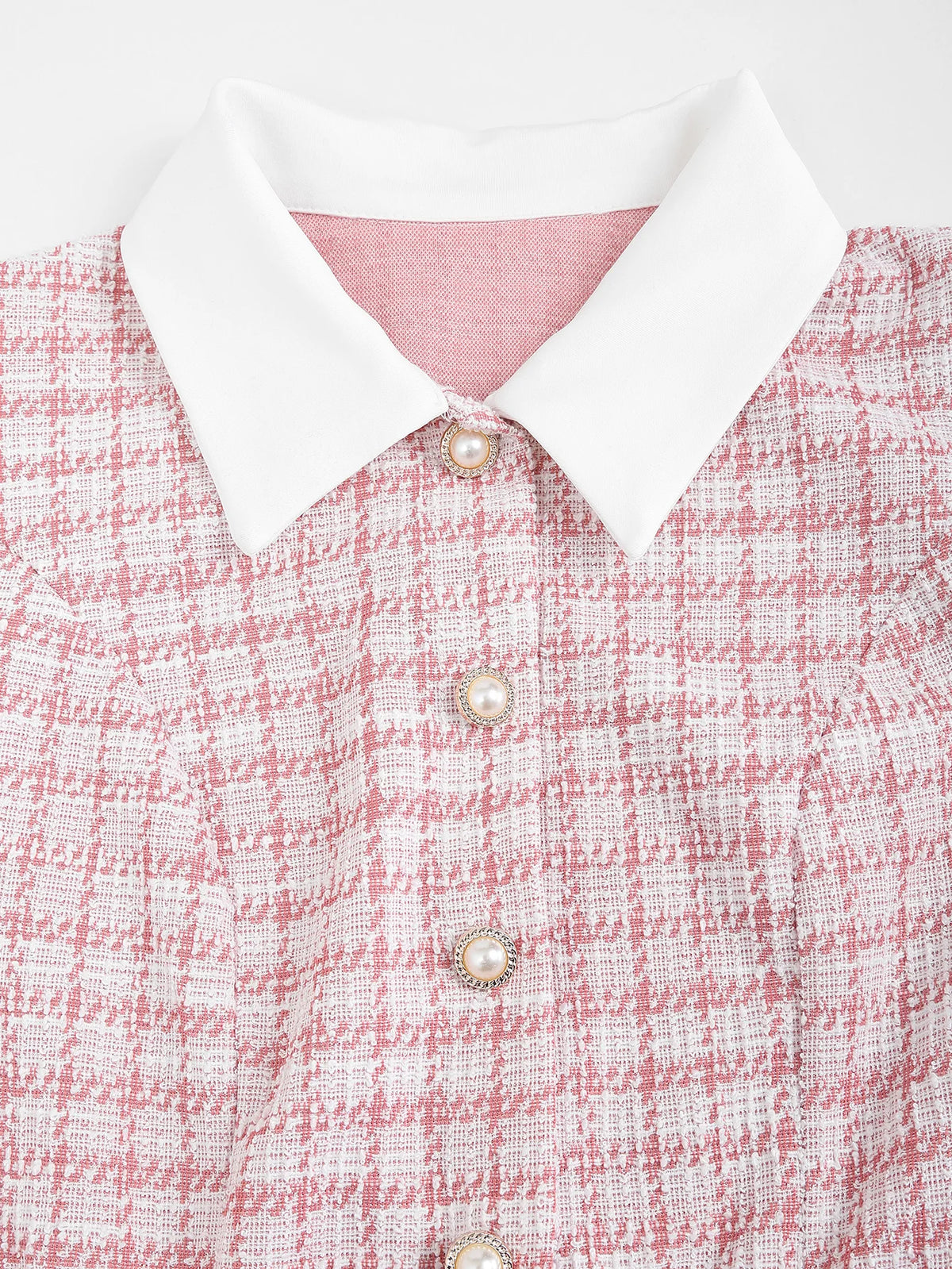 Pink plaid mini dress for women with short sleeves and belt, by Corporación Turística, styled with casual, trendy fashion.