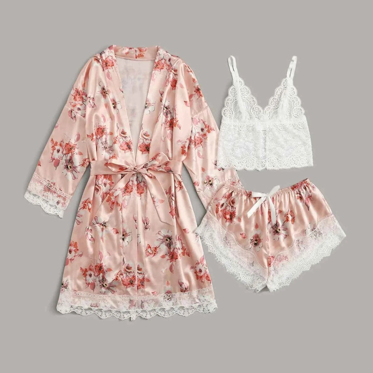 Set of three women's pink pajamas by Corporación Turística, comfortable sleepwear and loungewear for women.