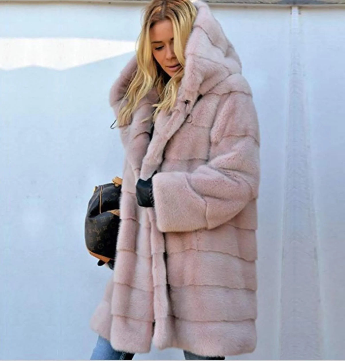Pink synthetic fur coat for women from Corporación Turística, cozy and stylish with a warm, plush appearance.