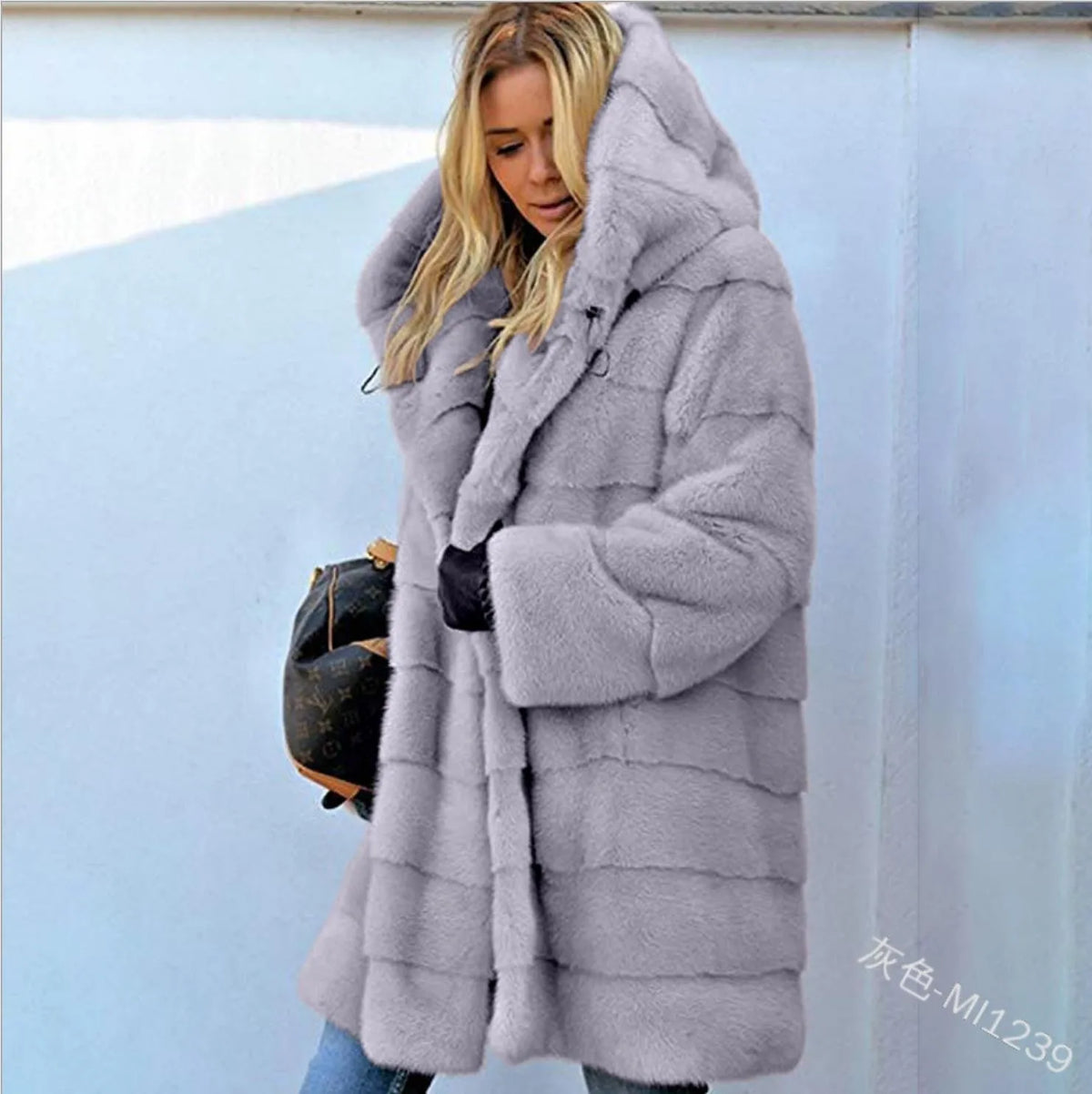 Pink women's warm synthetic fur coat from Corporación Turística, with cozy design and plush texture.