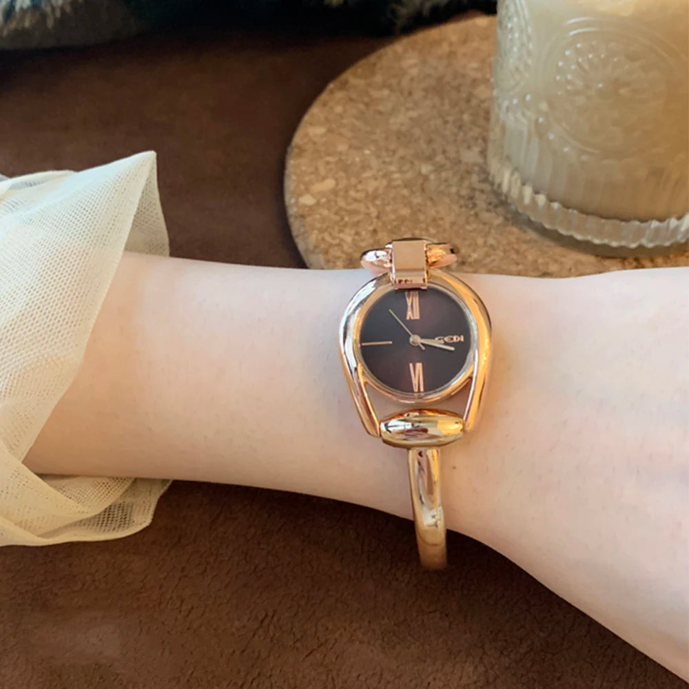 Rose brown quartz watch with stainless steel strap, modern style, by Corporación Turística.