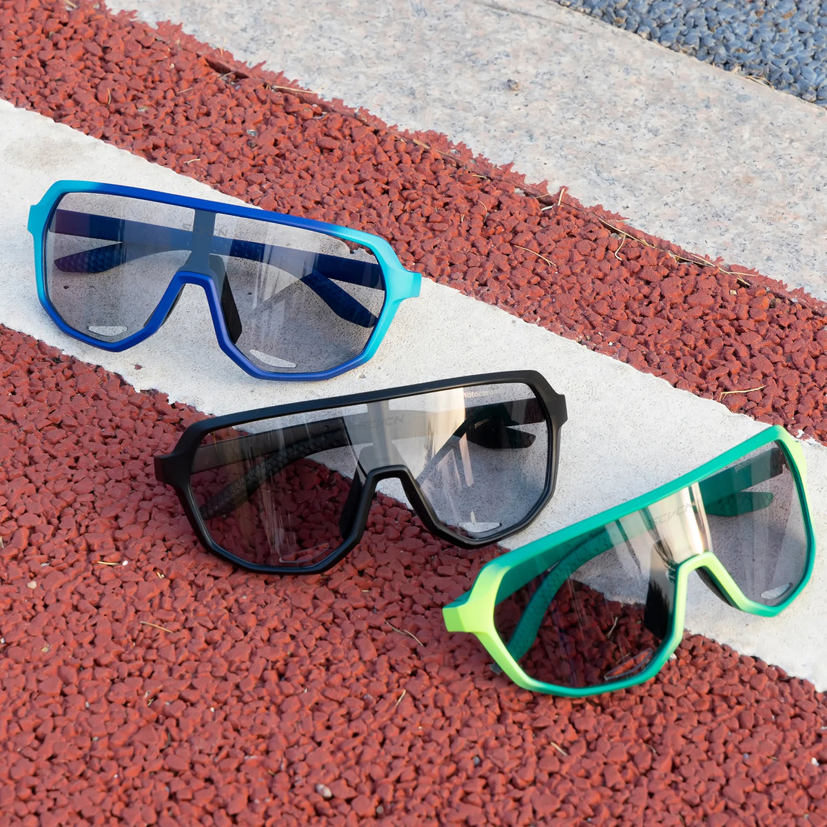 Photochromic cycling sunglasses by Corporación Turística, lightweight sports glasses with adjustable fit and UV protection.