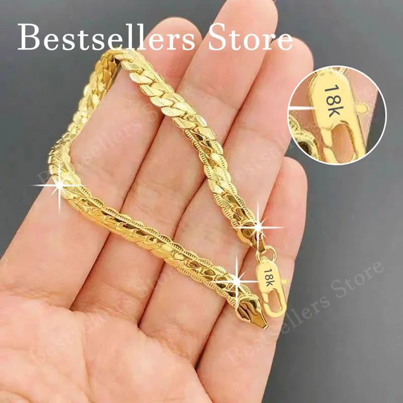 Sterling silver 925 bracelet with 18K gold accents, featuring a raised relief design, 20 cm length.