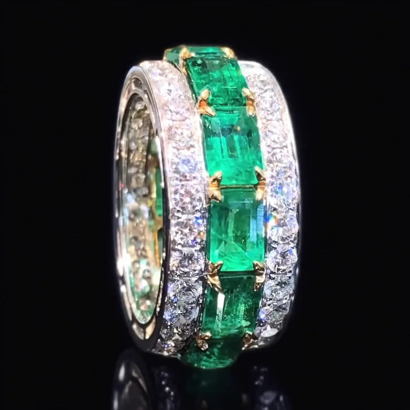 Silver wedding rings with square green design and full zirconia accents, crafted by Corporación Turística.