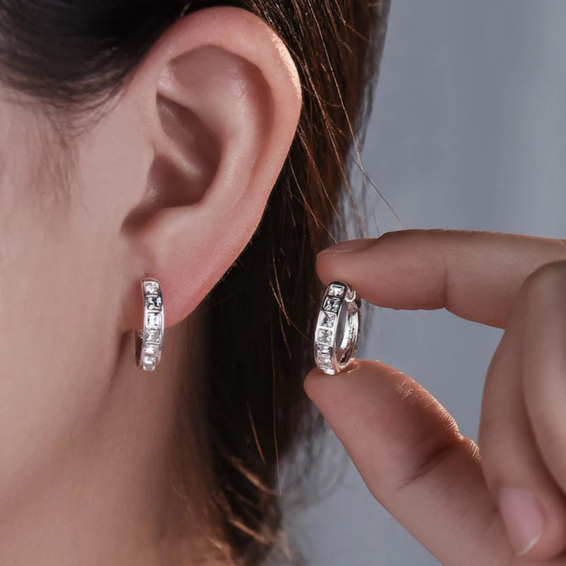 Silver 92% sterling earrings with sparkling cubic zirconia stones, stylish and elegant jewelry by Corporación Turística.