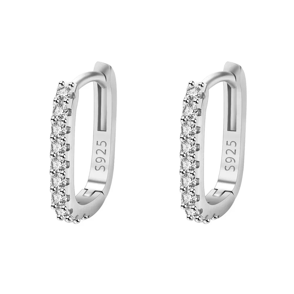 Sterling silver 925 circular hoop earrings by Corporación Turística, showcasing polished round design and smooth finish.