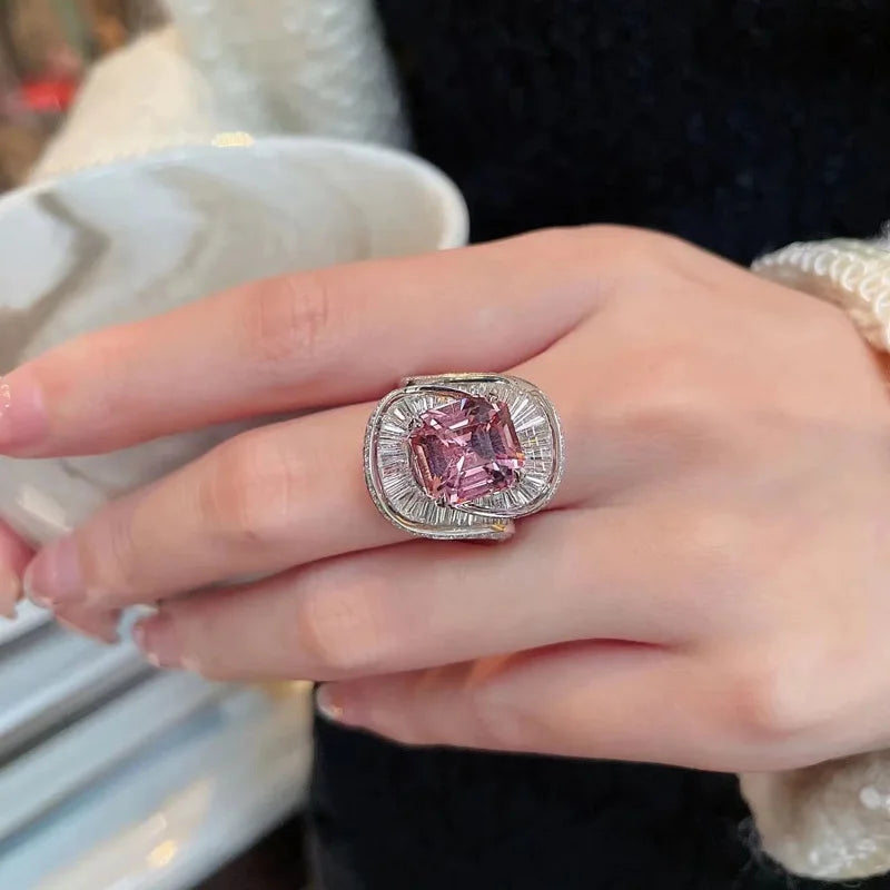 Silver adjustable ring with pink quartz flower dangle charms, wedding jewelry featuring floral design from Corporación Turística.