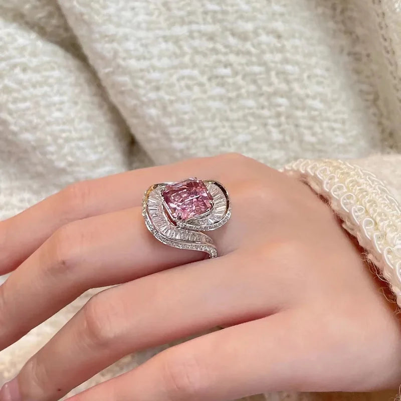 Pink quartz pendant with floral design, silver adjustable ring, handmade wedding jewelry by Corporación Turística.
