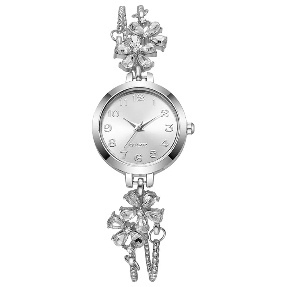 Silver women's adjustable quartz watch by Corporación Turística, water-resistant with a sleek, modern design.