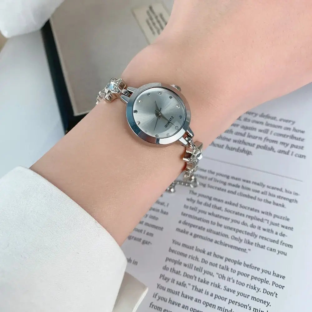 Elegant silver and white adjustable bracelet watch with sparkling pedrería from Corporación Turística.