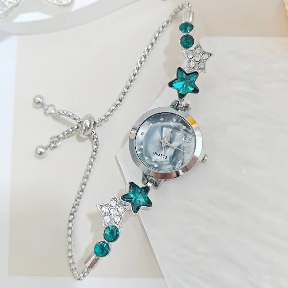 Silver adjustable wristwatch with sparkling rhinestones from Corporación Turística, elegant design with a round face and metal band.