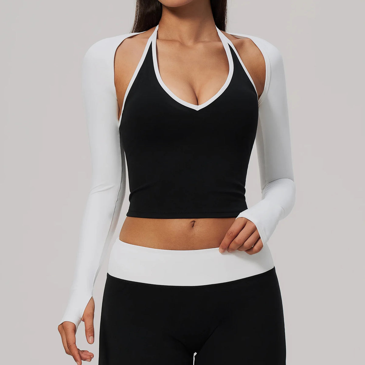 Sky blue long-sleeve backless yoga shirt for women by Corporación Turística, lightweight and comfortable for active wear.