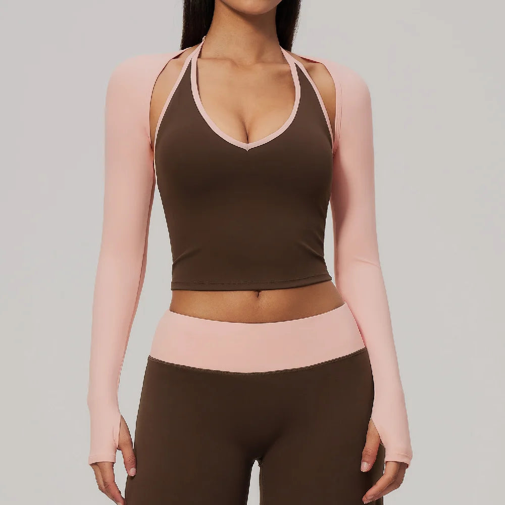 Sky blue long-sleeve backless yoga shirt for women by Corporación Turística, shown on a model, perfect for active wear.
