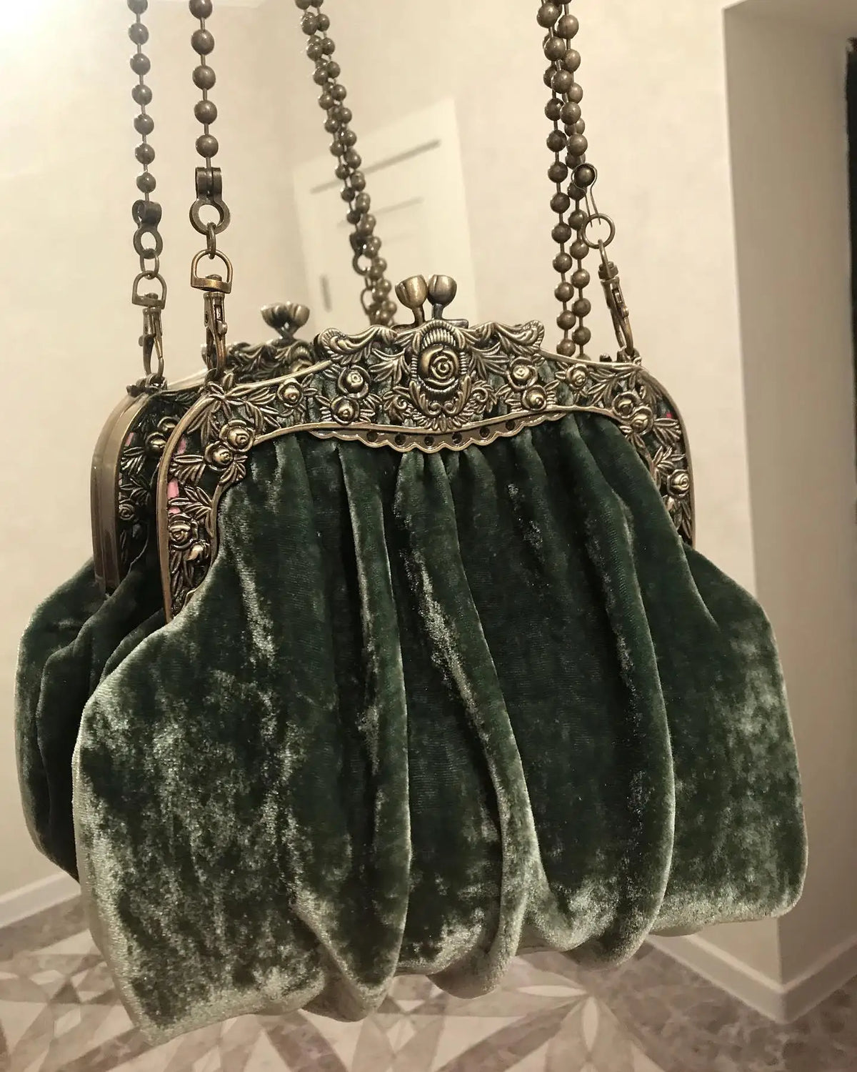 Vintage velvet clutch bag with secure clasp, solid color design, by Corporación Turística, elegant and stylish for evening use.