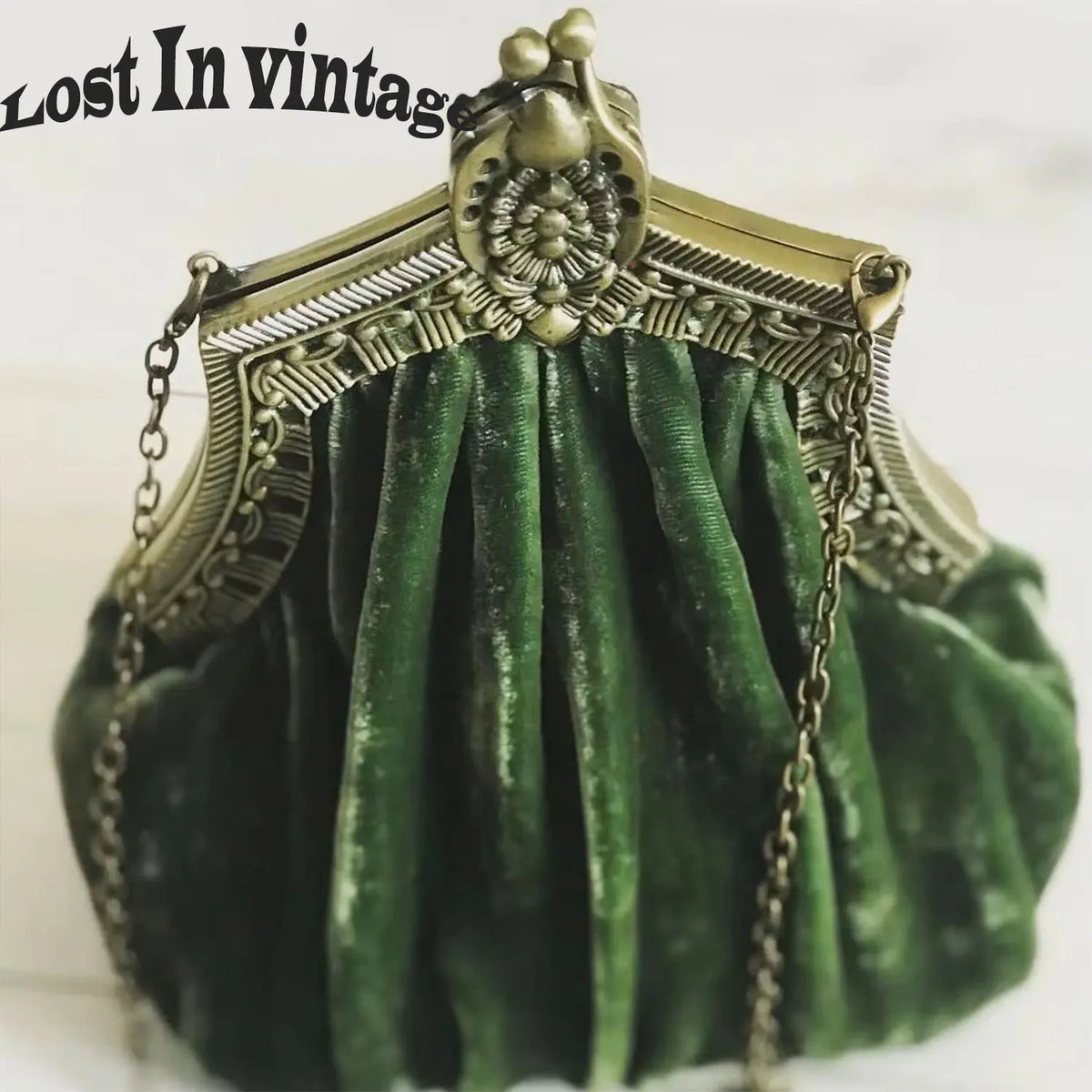 Vintage velvet clutch bag with secure clasp, solid color design, from Corporación Turística, ideal for elegant evening accessories.