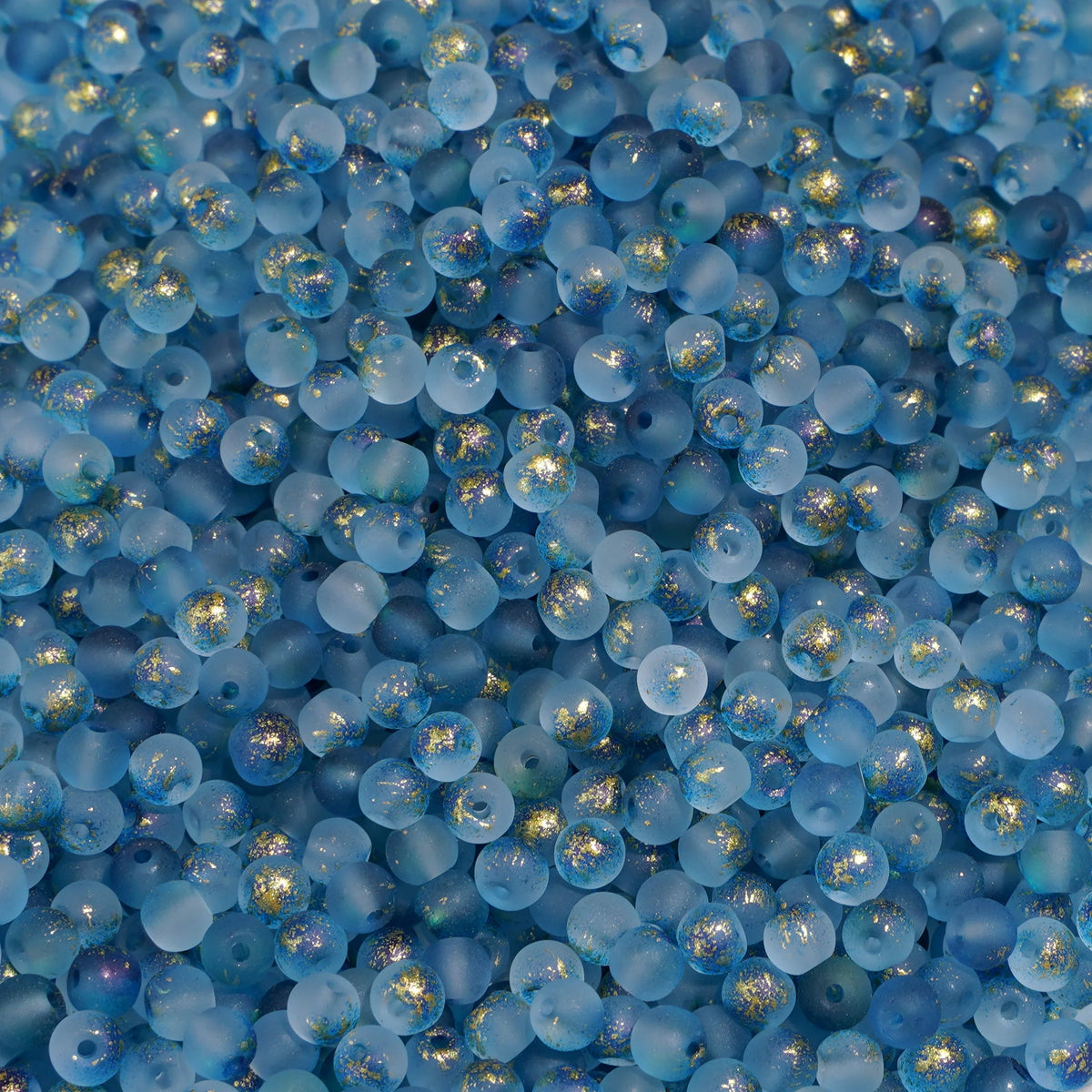 Set of 100 gold-splashed rice-shaped glass beads for jewelry making by Corporación Turística, showing colorful glossy beads.