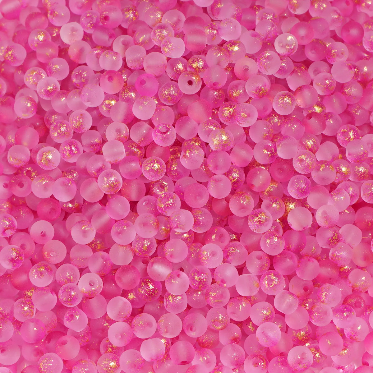 Set of 100 gold-splashed glass rice beads by Corporación Turística, 4mm size, perfect for jewelry and craft projects.