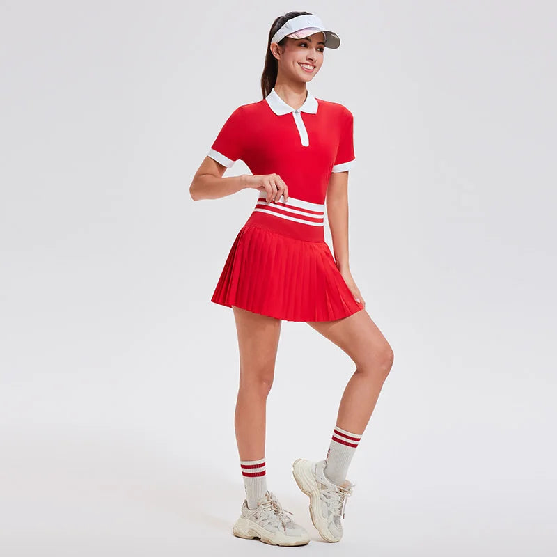 Red women's summer schoolgirl polo set by Corporación Turística, includes a collared top and matching shorts.