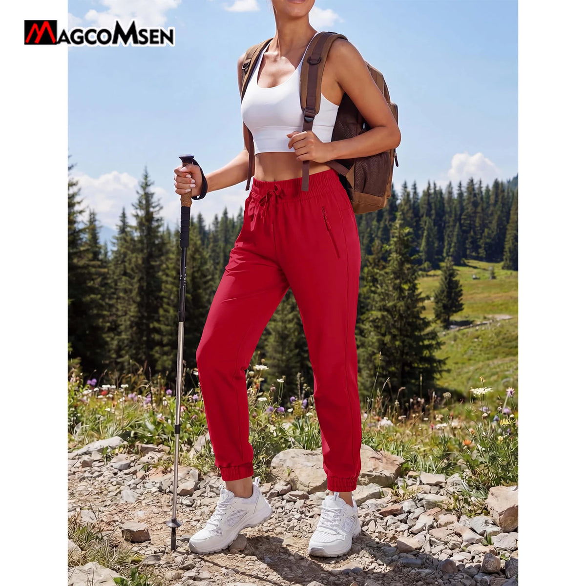 Magcomsen waterproof hiking pants for women in vibrant tomato red, designed for outdoor adventures and durability.