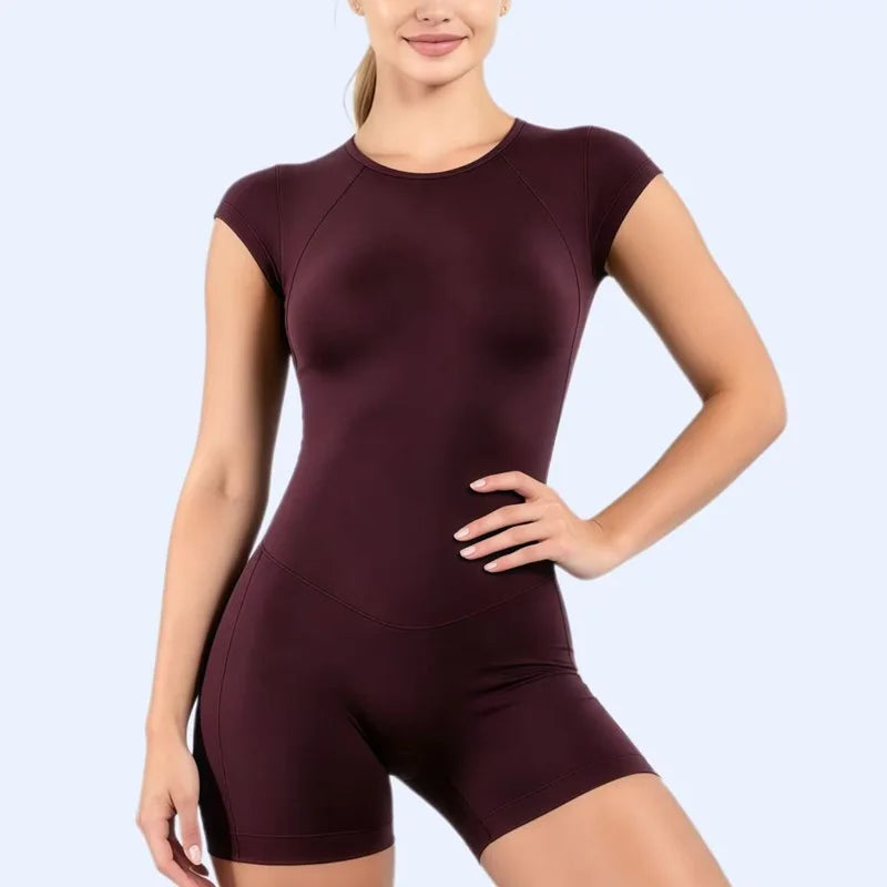 Histello women's short-sleeve sporty bodysuit in ultra violet, made of breathable fabric, designed for active wear and comfort.