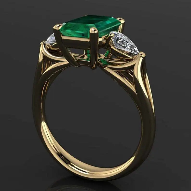 14k gold emerald ring for women featuring a vibrant green emerald gemstone, elegant jewelry by Corporación Turística.