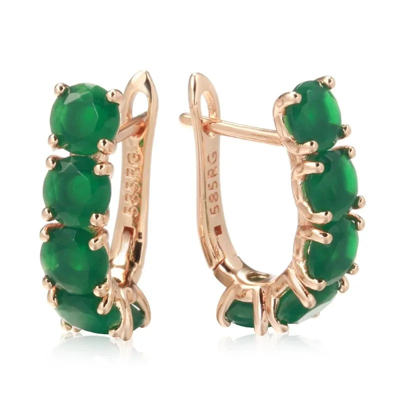 14K gold multi-stone ring for women with emerald accents, featuring natural emeralds and elegant gold craftsmanship.