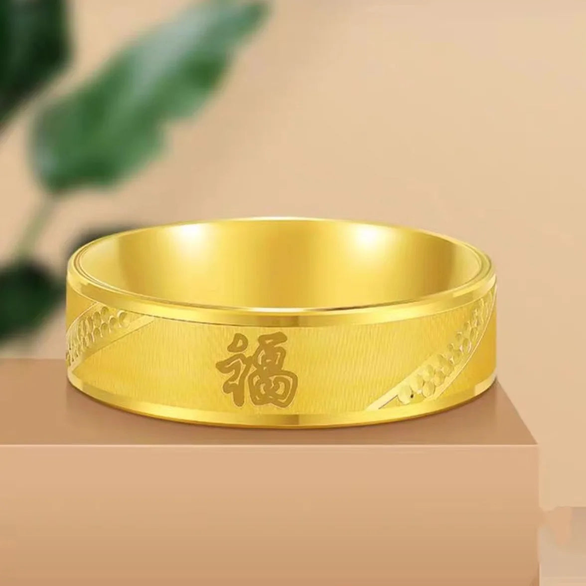 Pair of 24-karat pure gold jewelry from Ping An Joy, featuring intricate traditional Chinese designs, by Corporación Turística.