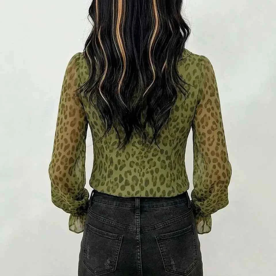 Green women's sexy blouse with ruffles and V-neck from Corporación Turística, elegant stylish top with feminine details.