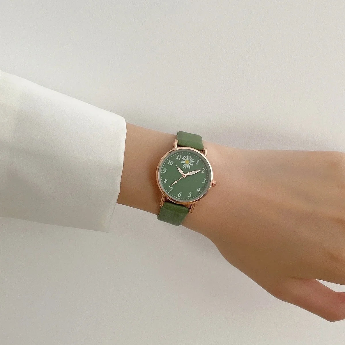 Electronic green wristwatch with round dial and quartz movement by Corporación Turística, featuring a sleek digital bracelet design.