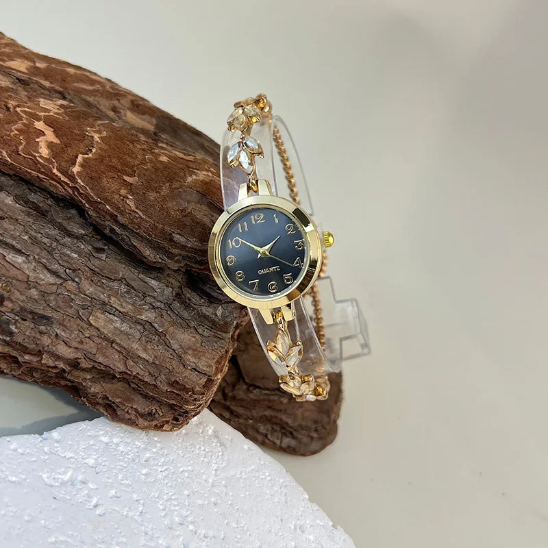 Elegant women's quartz watch with a round case, featuring a green strap and sleek design by Corporación Turística.