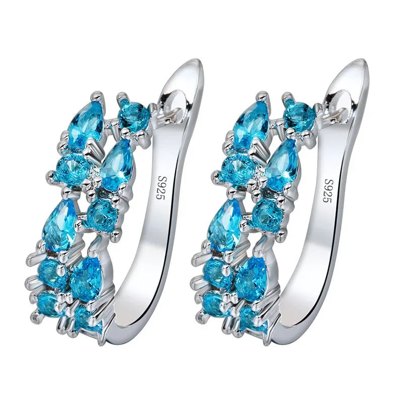 Sterling silver 925 earrings from Corporación Turística, stylish and elegant jewelry for women.