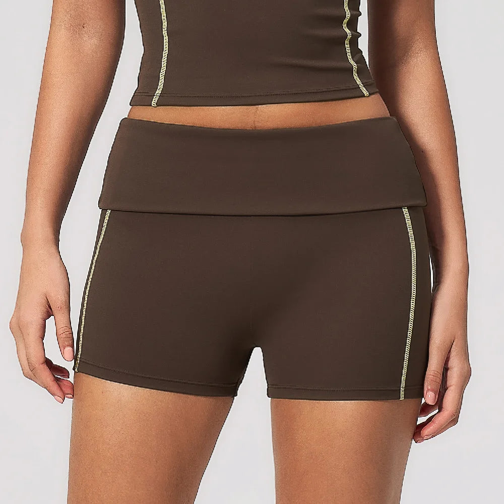 High-waisted women's yoga shorts in breathable fabric with a vintage apricot color, by Corporación Turística.