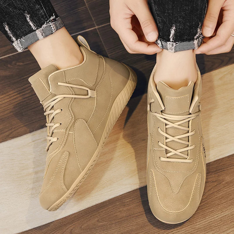 Black men's high-top moccasin-style casual sports shoes by Corporación Turística, showcasing the footwear's design and material.