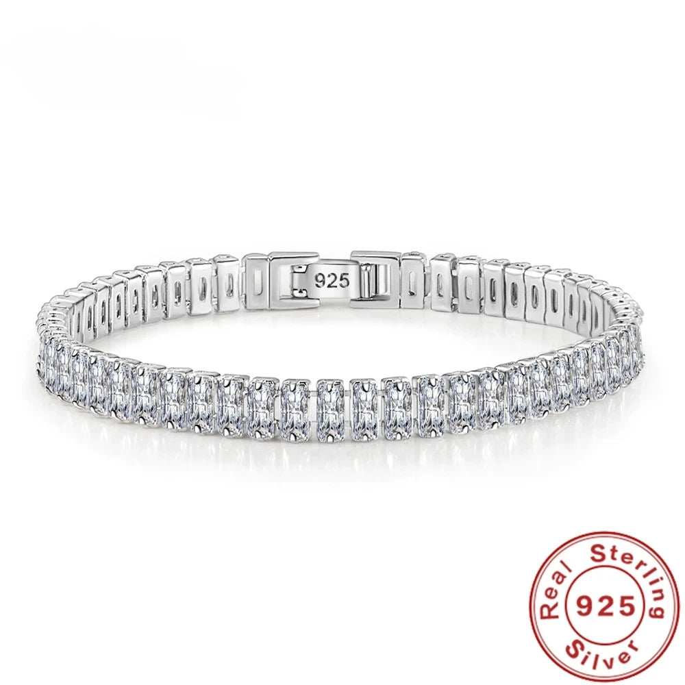Sterling silver bracelet with crystals, elegant design from Corporación Turística, showcasing the detailed craftsmanship and sparkling accents.