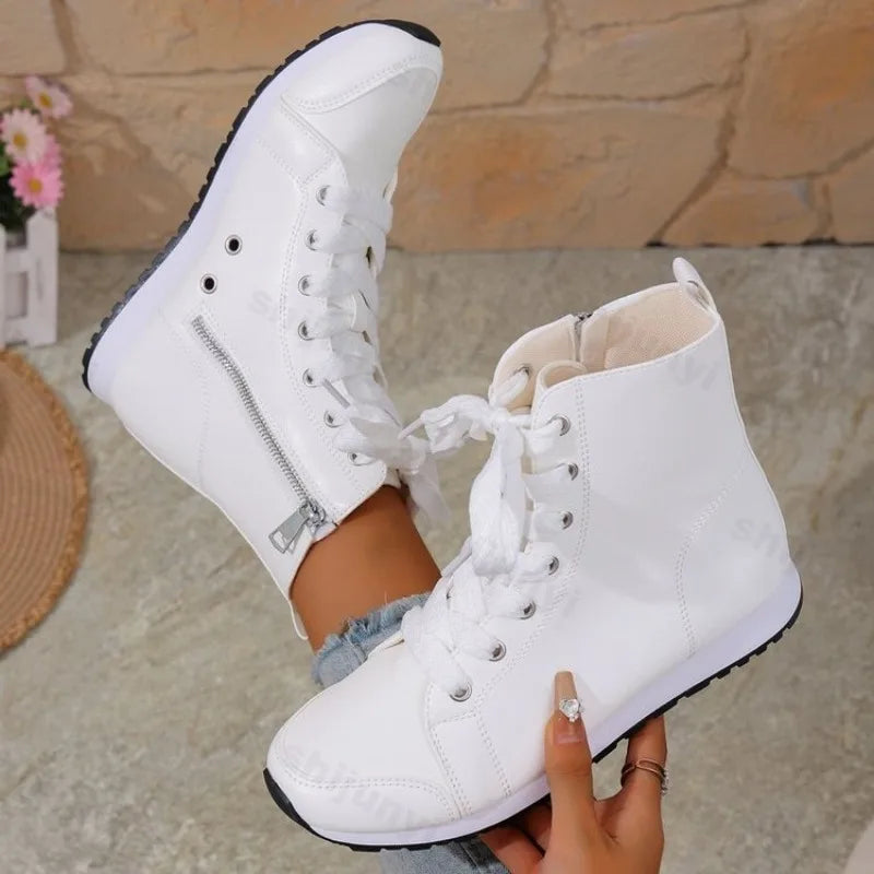 White women's spring and autumn ankle boots from Corporación Turística, featuring a stylish, comfortable design for seasonal wear.