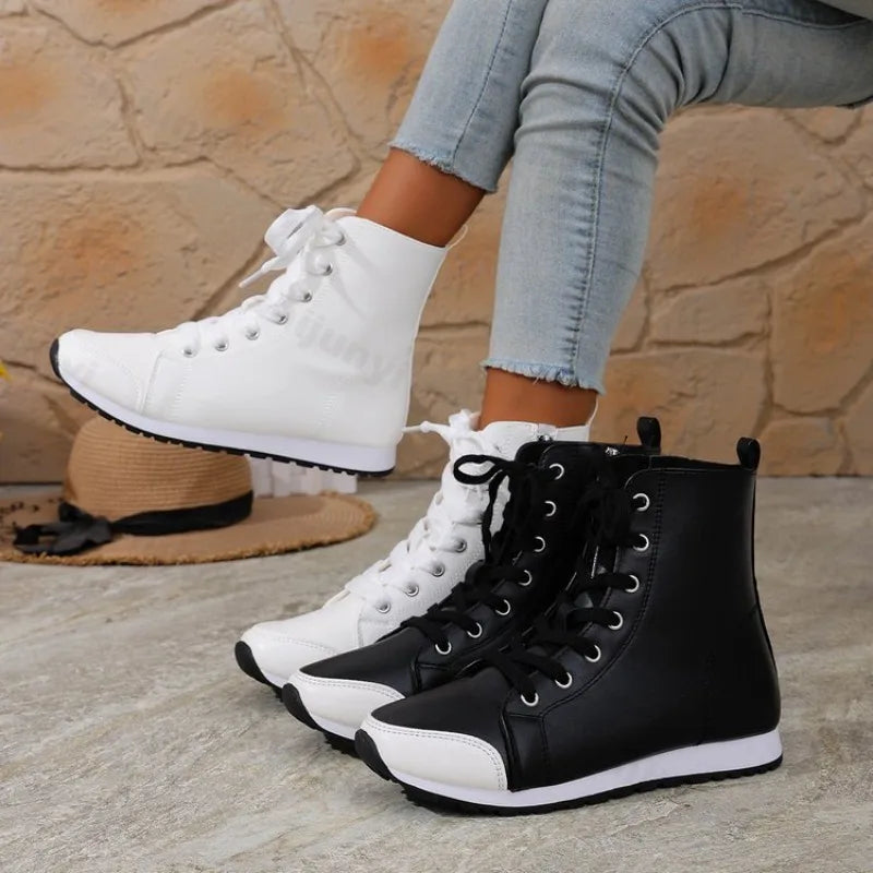 White women's spring and fall short boots from Corporación Turística, featuring a stylish and comfortable design.