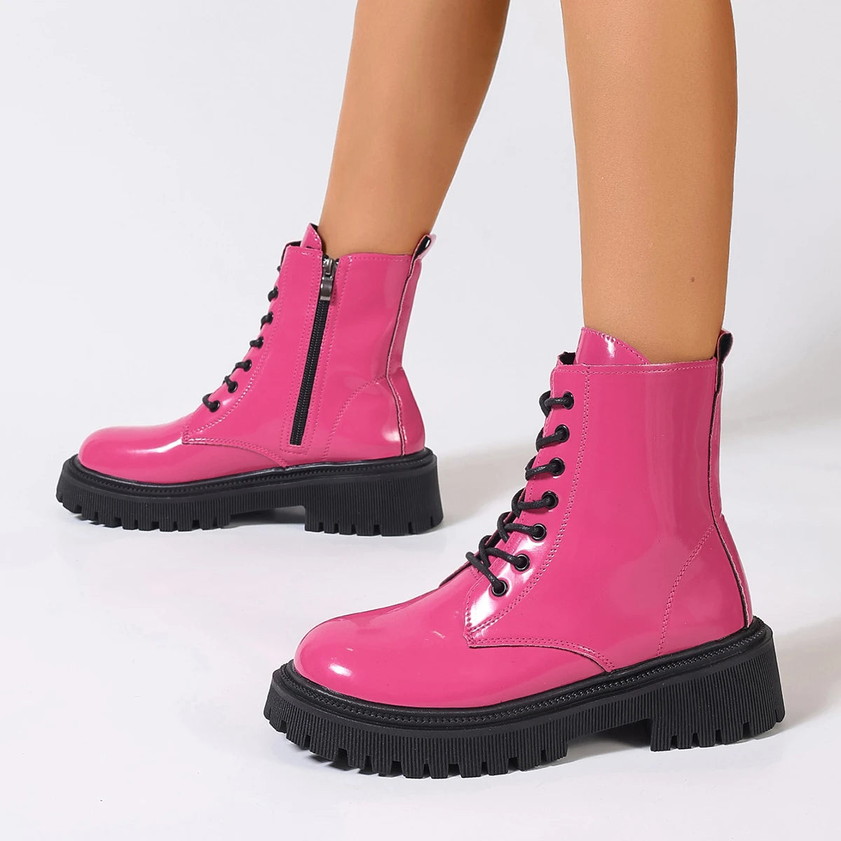 High-quality women's leather ankle boots in white with a stylish design, perfect for casual or dressy outfits.