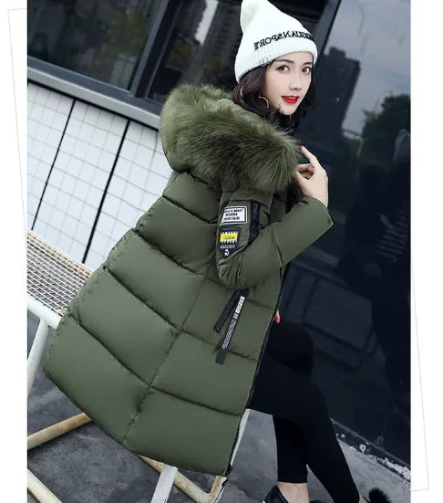 Women's winter parka coat with faux fur collar, white color, by Corporación Turística, suitable for cold weather.