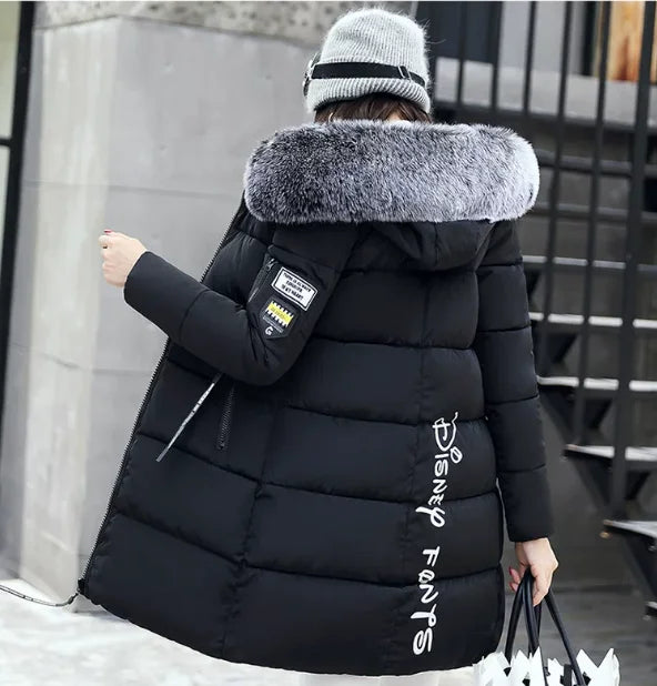 White women's winter parka coat with faux fur collar from Corporación Turística, featuring a warm, stylish design for cold weather.