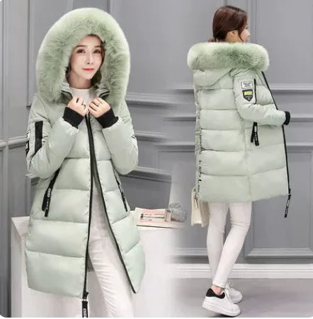 White women's winter parka jacket with fur collar by Corporación Turística, featuring a warm, stylish design for cold weather.
