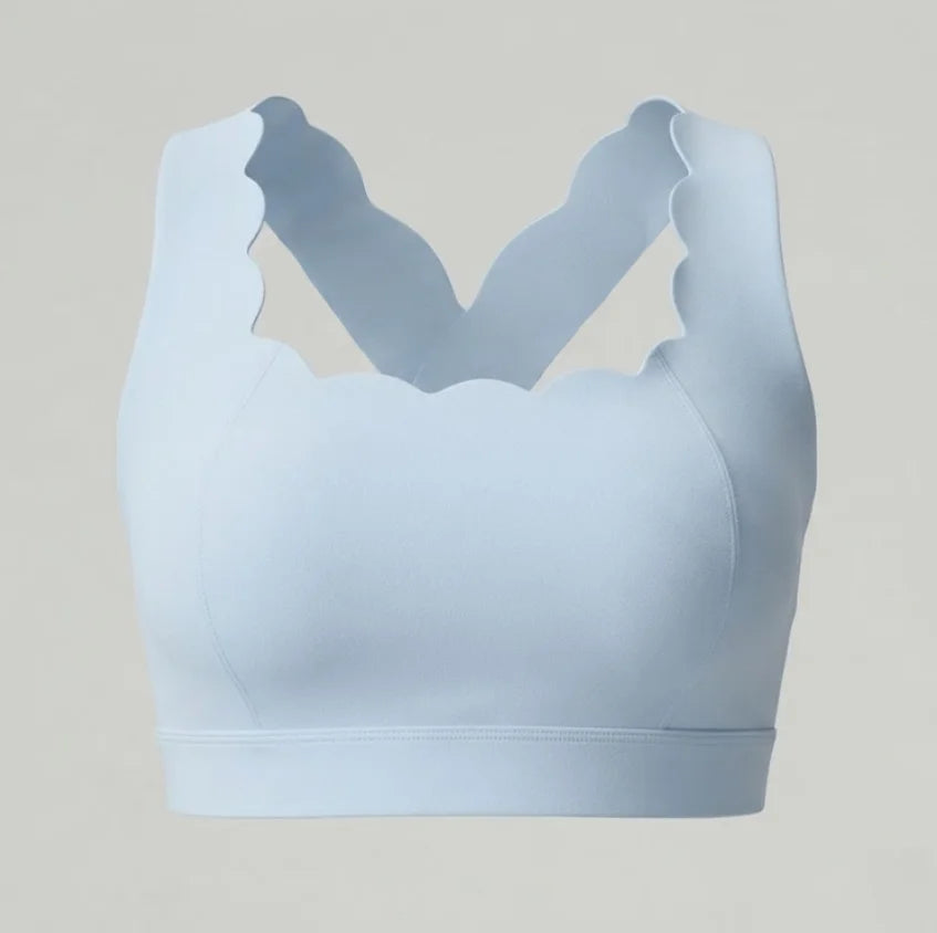 White two-piece women's yoga set from Corporación Turística, includes sports bra and matching yoga pants.
