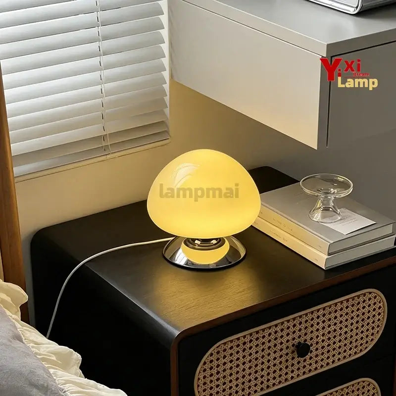 Murano glass table lamp with a round disco shape, featuring clear crystal design and a sleek white base.
