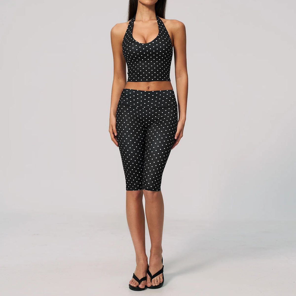 Two pairs of white yoga capri pants by Corporación Turística, made from comfortable, stretchy fabric for women.