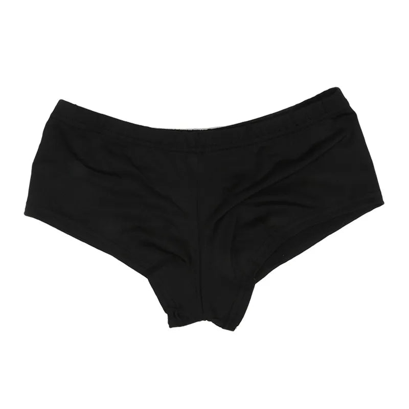 White high-waisted athletic shorts for women by Corporación Turística, shown on a model.