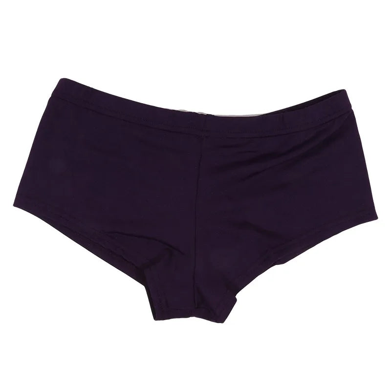 White high-waisted women's sports shorts by Corporación Turística, lightweight and comfortable for active wear.